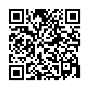 众弟子兴高采烈地抬着妖兽的尸体走进城门二维码生成