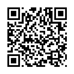 伙计一边带着张铁往客栈里面走去二维码生成