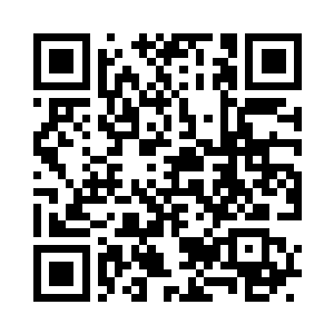 似乎很是认真的倾听着史春林的讲话二维码生成