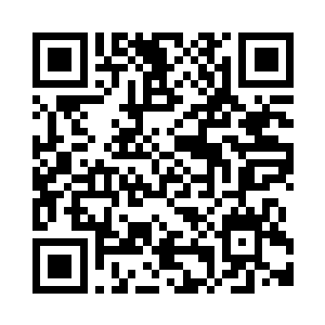 似乎是用墨碳一类的东西写上去的二维码生成