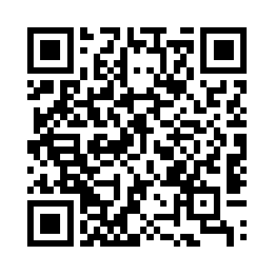 但是像这样沉静肃然的表情还是很少见的二维码生成