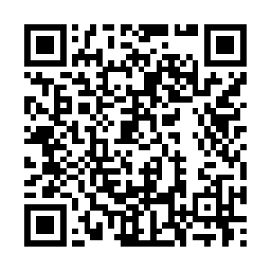 使不算宽阔的马路看上去好像一条比较宽阔的胡同二维码生成