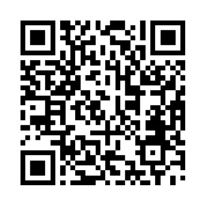 停车场以及外面马路上正赶着上班的人多得很二维码生成