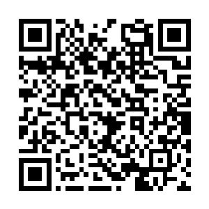 先前那位打电话的中年男子就是本市的一位副市长二维码生成