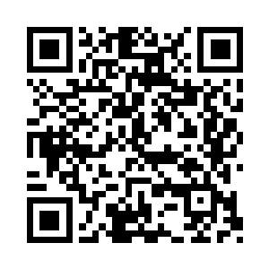 其中位于东方的土峰上面刻有一个奇怪的字符二维码生成