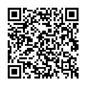 其中最窄的一段处于两块巨大的石头的缝隙之中二维码生成