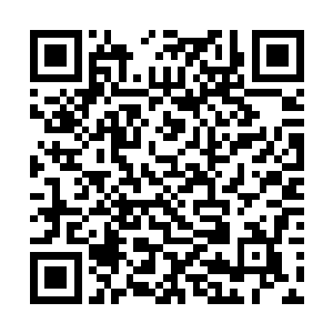 其颜色竟渐渐的变成了与四周铁岩土一般的乌黑之色二维码生成