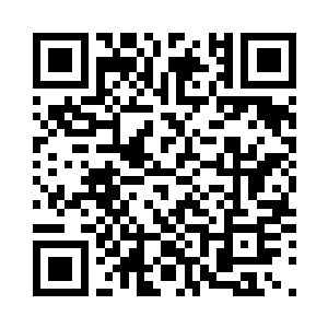 再往里就是一个雕花月亮门的大隔断二维码生成