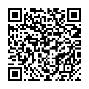 冬日那稀薄的是……曦在穿透高楼大厦构建的钢筋森林之中二维码生成
