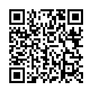 几个陈旧磨得破碎的垫子随意摆放在佛龛前二维码生成