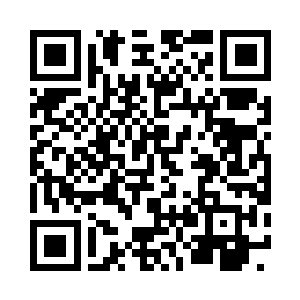 几人来到一间摆满电脑设备的办公室中二维码生成