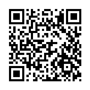 刘世杰在车上的时候就被戴上了黑头套二维码生成