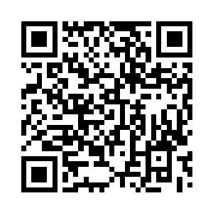 刘昌伟手中的枪支散发出冰冷的寒意二维码生成