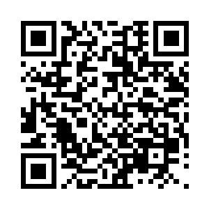 刚好有勤工俭学的维护人员从里面走出来二维码生成