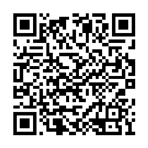 前面还有两百多米的地方就接近那栋指挥大楼了二维码生成