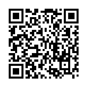 剩下的四条手臂有两条分别握住乾坤双圈二维码生成