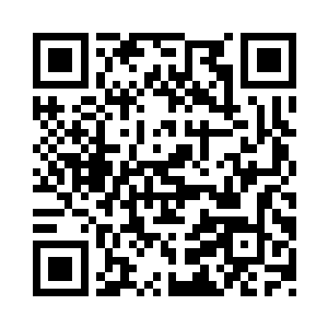 副市长唐东升热情地和校长钟景华握手二维码生成