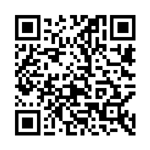化为一座高达十五六米的由岩石组成的巨人二维码生成