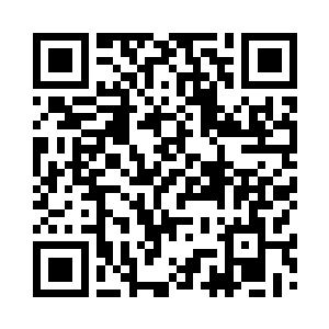 医生在房间里给关灿灿做着全面检查二维码生成