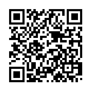 卡瓦尼微微眯缝了一下眼睛才看到二维码生成