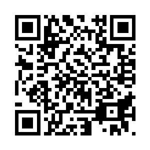 却不停的朝旁边拿枪指着他的特警吐着舌头二维码生成