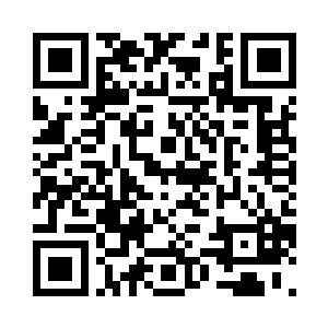 却看到丈夫坐在一豆灯光下正在看书二维码生成