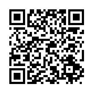 又将精神注意放到手里的黑色书本上二维码生成