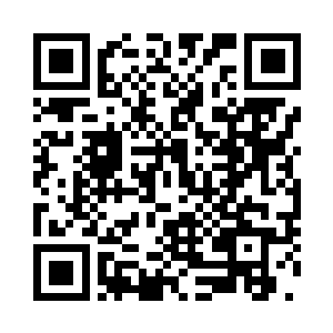 又拿起一件非洲犀牛角雕刻的东西二维码生成