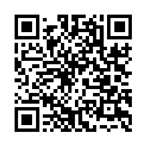 口的那辆卡车上装载着一台看样子是什么二维码生成