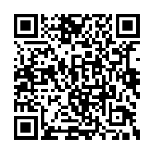 另外一个男人敲碎的酒瓶子扎进了光头的脖子里二维码生成