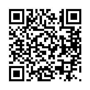 另外一只手提紧了三个沉甸甸的箱子二维码生成