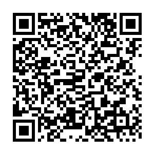 另外一边的生产车间也是利用那些纤维浆和煤渣混合生产东西的地方二维码生成