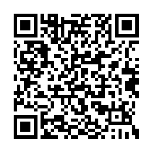 只有牲口蹄子踩在碎石路上发出一点细微的声音二维码生成