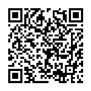 只见华盛顿的额头上竟然浮现出一抹诡异的土黄色二维码生成
