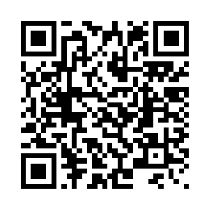 只见苏正刚正埋头在办公桌前忙碌二维码生成