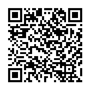 只见血色骷髅头的身体也开始缓缓的朝着黑莲之中移动过去二维码生成