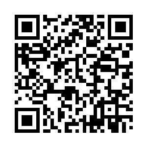 只见黑炭正在追沙滩上一群横行逃跑的螃蟹二维码生成