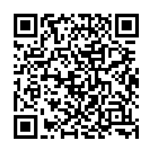 可是他要同时引导四枚激光制导炸弹分别命中两栋大楼二维码生成