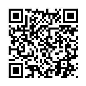 和脸色铁青的钟浩天他们说了一声二维码生成