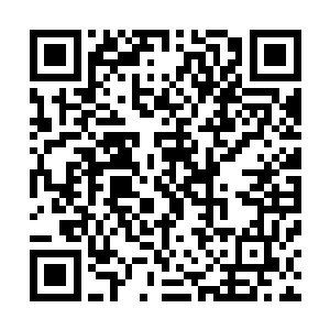 咕仔手持拨浪鼓催动拨浪鼓内里灵力去袭击那鬼魂的脑袋处二维码生成