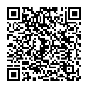 喧闹不休的老特拉福德球场本场比赛第二次陷入了死一般的寂静……二维码生成