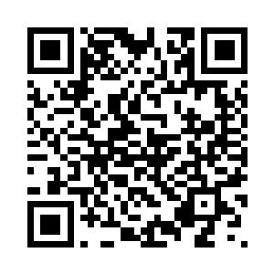 嘴角勾勒起一抹从容而自信的笑容二维码生成