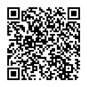 圆桶中的油脂物质遇上火星顿时腾的一下行程一片火焰熊熊燃烧起来二维码生成