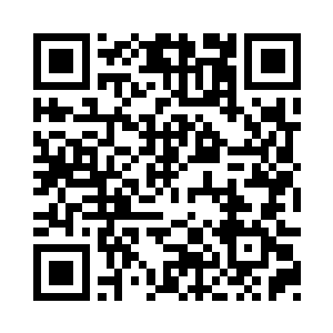 在一名很魁梧的大个子军官带了过来二维码生成