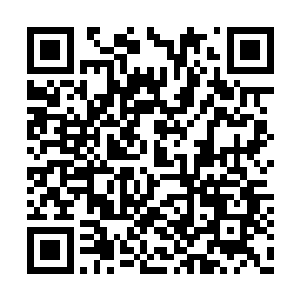 在中间一个极不显眼的位置就是通道入口所在了二维码生成