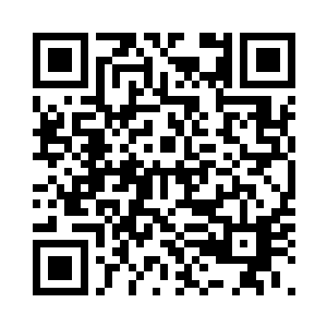 在主人房旁边有一排红墙绿瓦的房子二维码生成