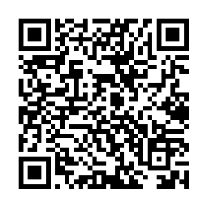 在右下角果真有个游戏商城的按钮……不过是红色的二维码生成