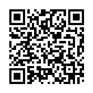 在墙边一张桌子底下取出一个袋子二维码生成