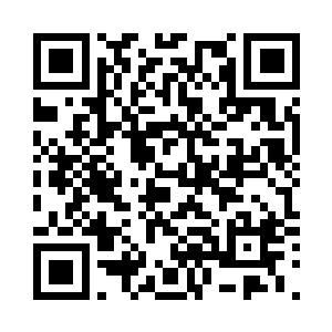 在小野次郎住处的这间书房的书架上二维码生成