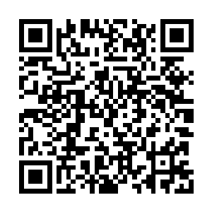 在工地上干活儿的本地人就是他的重点团结对象二维码生成